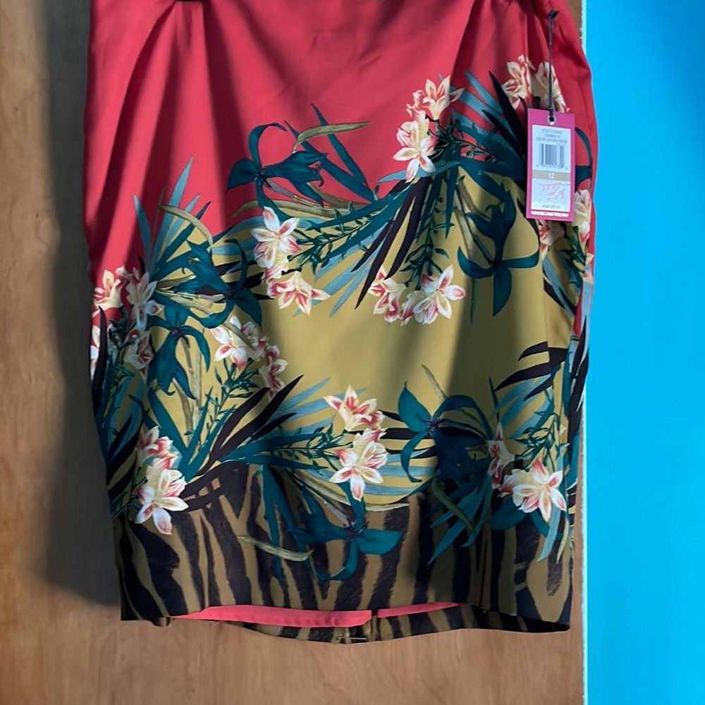 Printed mini skirt. Beautiful multi colored. Slit in the back.